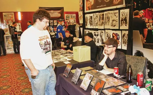 Brad Jones, aka The Cinema Snob, hawks DVDs and chats with fans during a recent horror-movie convention in Indianapolis. - PHOTO BY BRUCE RUSHTON
