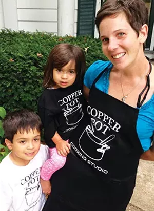 Ben, left, and Norah Perry with their mom, Chef Denise Perry. Her new cooking school features classes for children, as well as for adults.