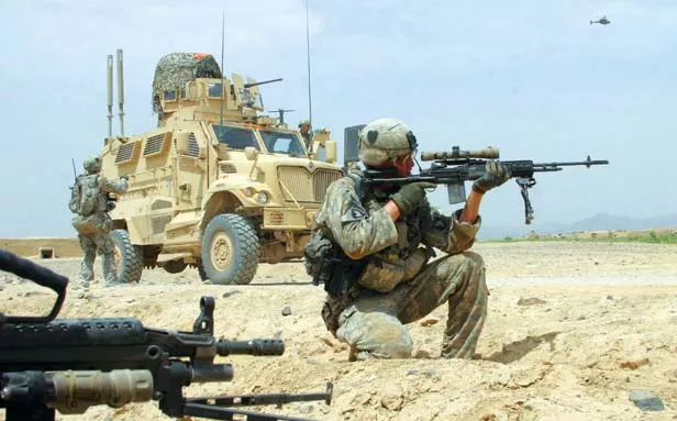U.S. soldiers with the 101st Airborne Division's 1st Battalion, 320th Field Artillery Regiment in Afghanistan on Aug. 8, 2010. - PHOTO BY DION NISSENBAUM/MCT