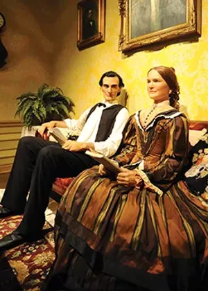 Visitors to the Abraham Lincoln Presidential Museum see Abraham and Mary during their courtship. The original “courting couch” is now on display at Edwards Place. - PHOTO COURTESY OF ABRAHAM LINCOLN PRESIDENTIAL MUSEUM