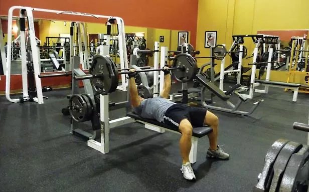 Weight lifting is just one offering at FitClub, which has three clubs in Springfield and wants to build a fourth in Chatham. - PHOTO BY PATRICK YEAGLE