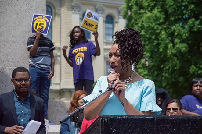 Rep. Litesa E. Wallace, D-Rockford, speaks to the crowd about her bill which could extend by 12 months the eligibility of families in the Child Care Assistance Program. - PHOTO BY ALEX CAMP