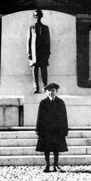 The seven-year-old Fitzgerald in 1918, posing in front of the Andrew O’Connor statue of Lincoln which had just been installed in front of the Capitol that year.