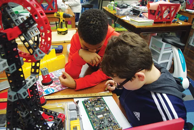 Andre Stanley and Porter Mansfield examine possible materials for their Rube. - PHOTOS BY DIANNE CROWN