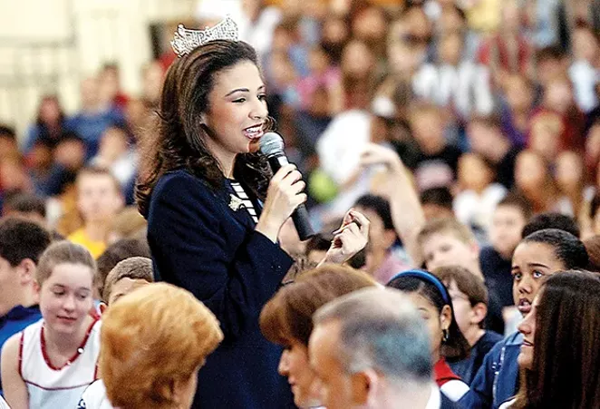 Erika Harold speaks at Margaret Mead Jr. High School in Elk Grove Village while reigning as Miss America in 2003. - PHOTO BY GEORGE THOMPSON/TNS)