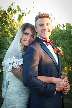 Molly Suhadolnik and Tim Hahn of Springfield, married Sept. 30 at Hill Prairie Winery. - PHOTO BY KATE BLANKENSHIP OF THIS BLUE DOG PHOTOGRAPHY