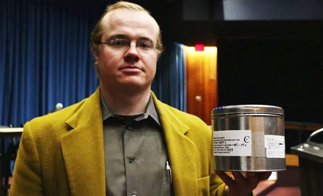 Dan Linn, executive director of the marijuana advocacy group Illinois NORML, holds a canister used by the federal government to mail marijuana to one of the last remaining participants in the federal medical marijuana program that began in 1978. In May, L - PHOTO BY PATRICK YEAGLE