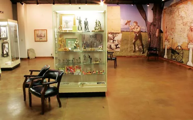 Display cases hold tools of the trade, including g a fascinating variety of plumb bobs. - PHOTO BY JOB CONGER