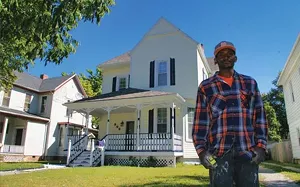 Before Jermaine Ward bought this house on North Fifth from Enos Park Development it had been considered a candidate for demolition. But over the past two years Ward, a building contractor, has lovingly restored it as his residence. - PHOTO BY JOE COPLEY