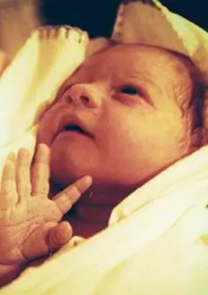 Feral, pictured above at Celeste’s birth, was one of Illinois’ first midwives to speak publicly about her patients’ rights. Before Celeste, pictured in the center, was born, Feral was subpoenaed by the state for ille - PHOTOS PROVIDED BY MARY O’KIERSEY