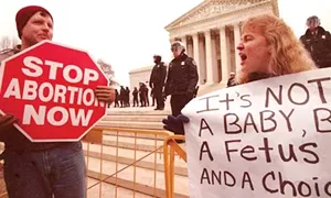Anti-abortion marchers gathered to protest the Supreme Court decision that legalized abortion in the United States. - PHOTO BY DEBBI MORELLO/MCT