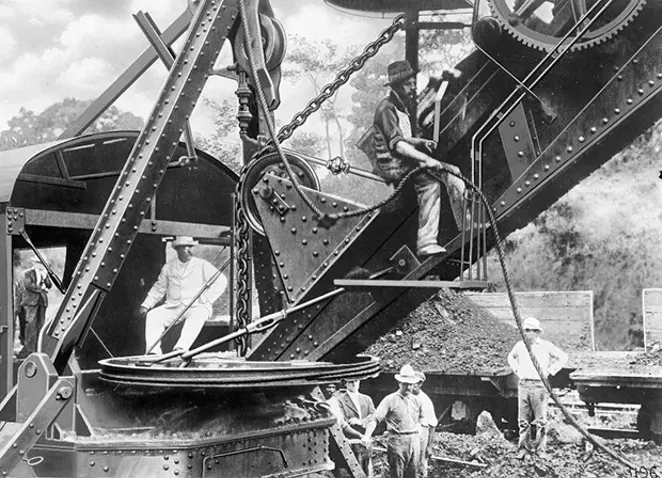 President Theodore Roosevelt, a champion of the Panama Canal, sits on equipment used at the site in this rare glass plate on display at the Caterpillar Visitors Center in Peoria. The center is celebrating Caterpillar’s role in the canal’s co - PHOTO COURTESY OF CATERPILLAR