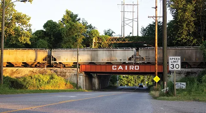 Driving into Cairo from the north, you pass a funeral home and a bridge underneath a rail line. There are structures behind this bridge that shut it off in case of flooding from the nearby Ohio and Mississippi rivers. - PHOTO BY MADELYN BECK
