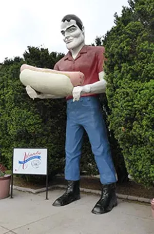 Legendary lumberjack Paul Bunyan looms over downtown Atlanta, Illinois. Town leaders acquired the 19-foot statue from a Route 66 restaurant in Cicero, near Chicago. - PHOTO BY BRENT BOHLEN
