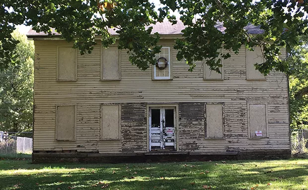 The Judge John Taylor House, located at 12th and Cass streets in Springfield, was built in 1857 and named one of the 10 most endangered historic places in Illinois in 2004. - PHOTO BY CAROL KNEEDLER