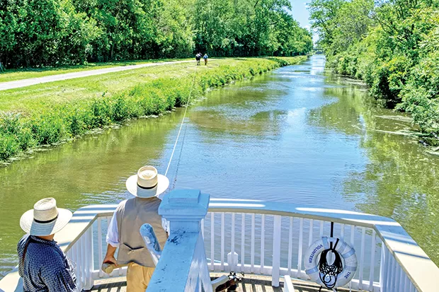 The Illinois and Michigan Canal became a National Heritage Area in 1984. Today, visitors can take an hour-long ride on a replica boat pulled by a mule and hear the canal’s history from costumed guides. - PHOTO BY RANDY VON LISKI