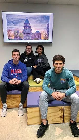 From left, Joel Niermann, Hannah Matrisch, Avia Wang and Kasra Nassirpour are Sangamon CEO students, who completed a survey and study of downtown parking. - CREDIT MARY HANSEN / NPR ILLINOIS