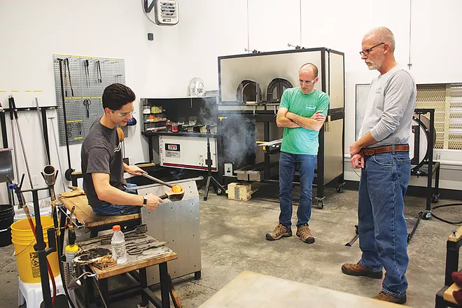 Mario Clarke, SAA’s artist-in-residence, teaches the glass-blowing classes and holds demonstration sessions. - PHOTO BY JANET SEITZ