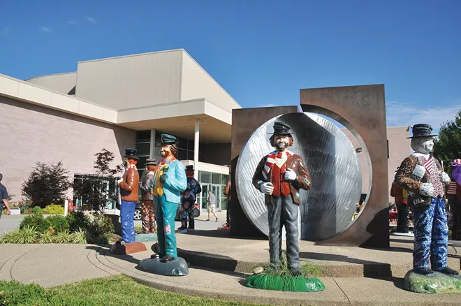 A collection of Freddie the Freeloader statues gather on the grounds of the Red Skelton Museum of American Comedy in Vincennes, Indiana, for the annual Red Skelton festival. The character was a favorites of Skelton, a Vincennes native. This year’s festival happens July 17-18. - PHOTO COURTESY OF DAVE FISHER