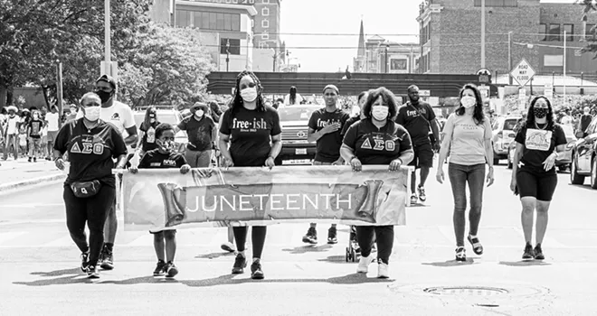 This year instead of Juneteenth celebrations at Comer Cox Park, participants marched to the Capitol. - PHOTO BY ZACH ADAMS, 1221 PHOTOGRAPHY.