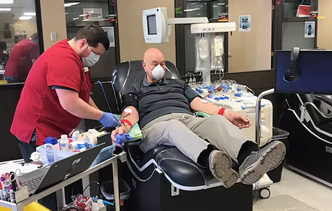 After being one of the first patients in Madison, Wisconsin, to be diagnosed with COVID-19, Gary Dalgaard, 75, became the first convalescent plasma donor in his area. He is shown here donating on April 10 at the American Red Cross in Madison. - PHOTO COURTESY AMERICAN RED CROSS