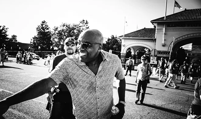 Illinois Attorney General Kwame Raoul interacts with parade-goers during the opening of the 2019 Illinois State Fair. - PHOTO BY ZACH ADAMS, 1221 PHOTOGRAPHY
