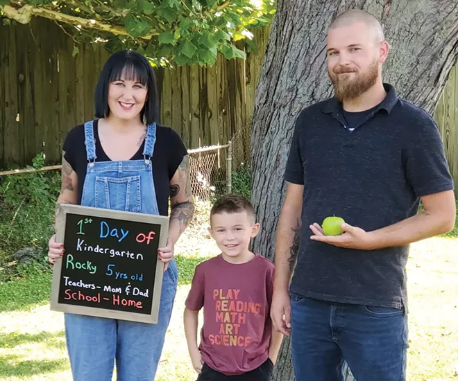Kelsey and Nick Pedigo will be teachers for their son Rocky this year, as they chose not to enroll him in school. - CREDIT: RACHEL OTWELL
