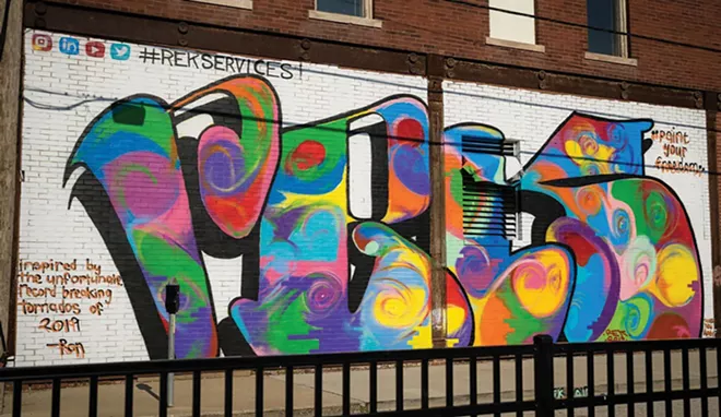 Ron's first major public mural, painted June 2019 on Third Street in downtown Springfield. Features his initials with colorful swirls inspired by the May 2019 Illinois tornado outbreak.