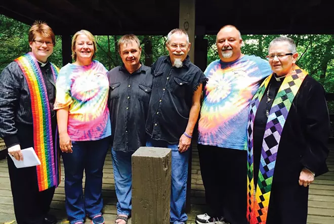Bowman and Carmichael on their wedding day, with family Lori and Harry Carlsen in tie-dye. - PHOTO COURTESY OF CARMICHAEL