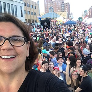 Jonna Cooley stands before a crowd at a former PrideFest. - PHOTO COURTESY JONNA COOLEY