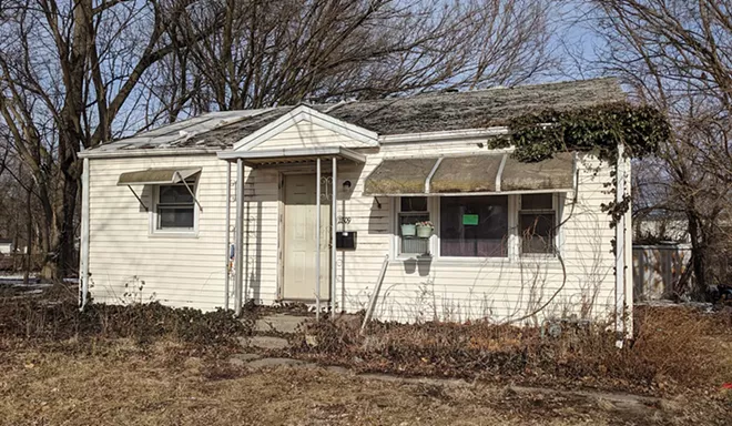 When the city sued two years ago to force fixes to this house, it discovered that the owner had died in 1964. - PHOTO BY BRUCE RUSHTON