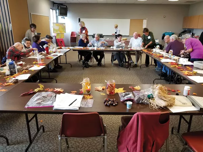 Minds in Motion fall program. Susan Helm led a bimonthly multisensory-themed themed program for people with dementia and their caregivers. She was inspired to help others with dementia after caring for her mother who had Alzheimer’s. - PHOTO BY GREG KYROUAC