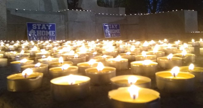 Katharine Eastvold and her friends held a candlelight vigil at the state Capitol - last April for those lost to COVID. At the time, the death toll in Illinois totaled about 2,000. We would need more than 10 times the candles today. - PHOTO COURTESY KATHARINE EASTVOLD