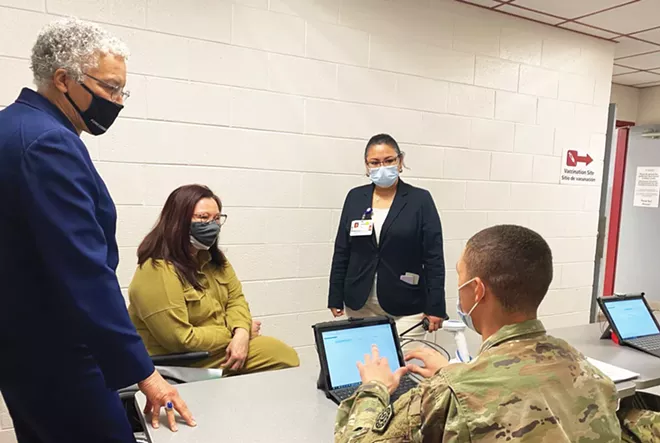 Duckworth visits a Cook County mass vaccination site at Triton College.