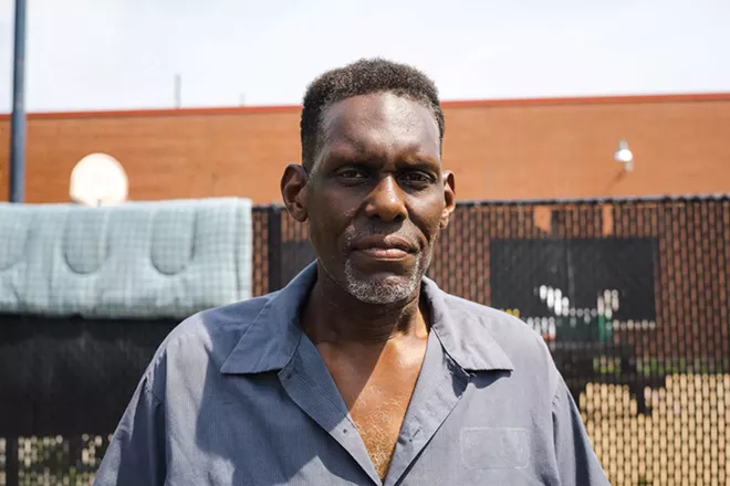Marshawn Higgins, pictured right, is a resident of so-called tent city, a place where people seek shade, rest and shelter - CREDIT: ZACH ADAMS, 1221 PHOTOGRAPHY