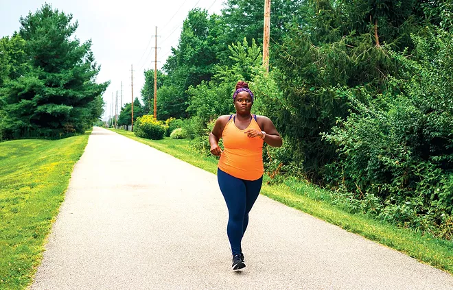 Randall runs on a path near her family home in Springfield during a recent visit to the capital city. - PHOTO BY ZACH ADAMS, 1221 PHOTOGRAPHY.