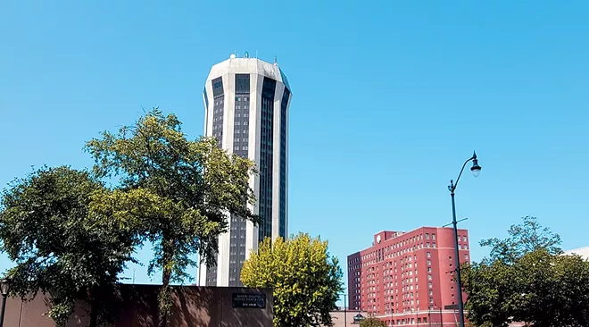 Hotel owners in Springfield, like those for the Wyndham Springfield City Centre on the left and the President Abraham Lincoln Springfield DoubleTree by Hilton Hotel on the right, will owe higher taxes due to a city ordinance that passed Sept. 7. - PHOTO BY RACHEL OTWELL