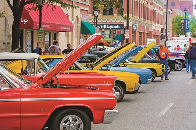 Hot rod classic cars line the street near Sixth and Monroe from a past International Route 66 Mother Road Festival. - CREDIT: ROUTE66FEST.COM