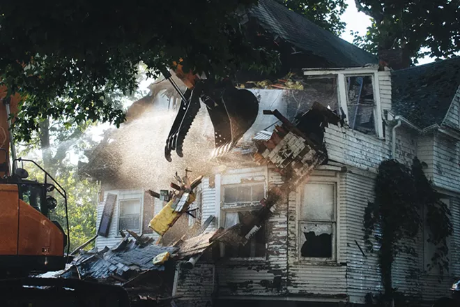 A home located on Lawrence Avenue was one of 22 residential properties that have been demolished so far this year. - CREDIT: LIZZIE ROEHRS