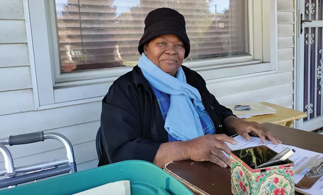 Alyce Lyle, overseeing the coat drive. She organizes events like this because that’s how she was raised: “My mom and dad gave a hand to anybody who went down the dusty road in Tennessee.” - PHOTO BY MARIA GARDNER.