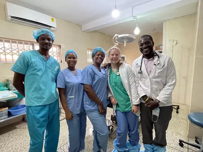 Operating room at International Mission Hospital in Ghana. Medical Students Theodore Agbemaple, right, and Emma Fenner, second from right. - PHOTO BY MICHAEL FENNER