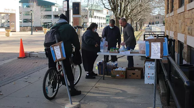 Grace Lutheran Church in downtown Springfield holds three food giveaways a week. The church no longer limits recipients to receiving food just once a month. - PHOTO BY STACIE LEWIS