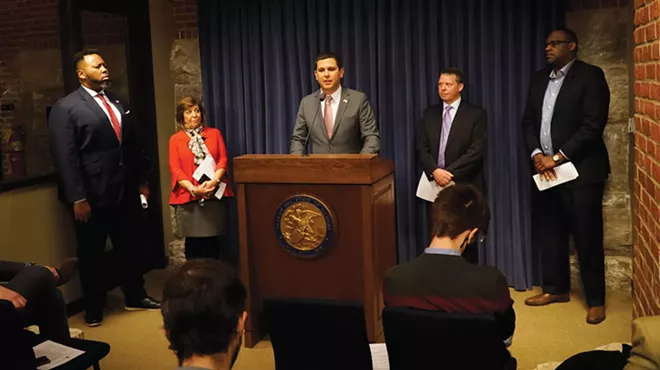 Supporters of a $250 million allocation of federal funds to help Illinois hotels recover from the COVID-19 pandemic explain legislation to carry out the proposal at a March 8 Capitol news conference. They included, from left, state Rep. Kam Buckner, D-Chicago; Sen. Sara Feigenholtz, D-Chicago; Michael Jacobson, CEO of the Illinois Hotel & Lodging Association; Darin Dame, general manager of Springhill Suites by Marriott in Springfield; and Anwar Martin, general manager of DoubleTree by Hilton Hotel in Bloomington. - PHOTO BY LEE MILNER.