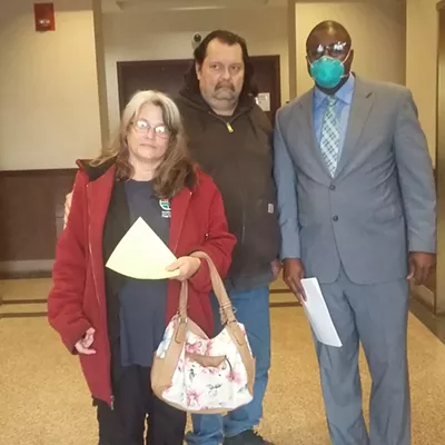 Rick and Carla Phelan with their lawyer Dowin Coffy.