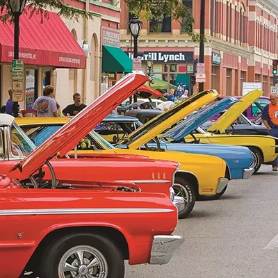 Hot rod classic cars line the street near Sixth and Monroe from a past International Route 66 Mother Road Festival.
