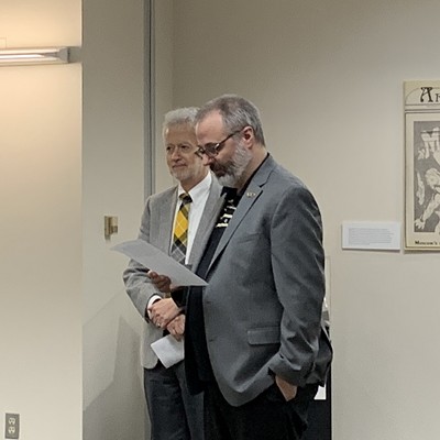 University of Idaho's University Archivist Robert Perret introduces Professor Kenton Bird (Moscow) who made the opening remarks celebrating 125 Years of the Idaho Argonaut. The display is on the second floor of the U of I Library.