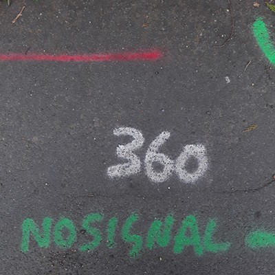 "360" written on pavement in Histon, near Cambridge, England; part of markings for sidewalk replacement, August 2019. Photographer, Priscilla Wegars