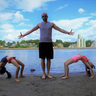 Our son,&nbsp;Scott, with his two daughters, Lindsay and Audjrey, doing backbends at Beachview Park, June 21, 2018. Photo by Mary Hayward of Clarkston.