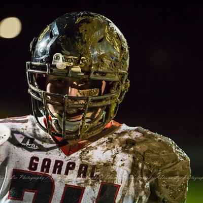 A rainy and muddy Friday night footbal! Taken 11/02/2018, GarPal vs Colton. GarPal win. This is my grandson after a tackle and slide into the mud!
    
    Suject, Caden Sanderson, 18yoa, Palouse, WA
    Parents: Mike and Traci Sanderson, Palouse, WA
    Photographer: Diana Lee