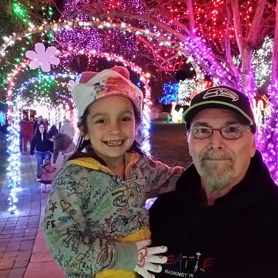 Our Granddaughter Lindsay with Gandpa Richard enjoying the lights at Locamotive Park Lewiston December 2014 Photographer Mary Hayward of Clarkston